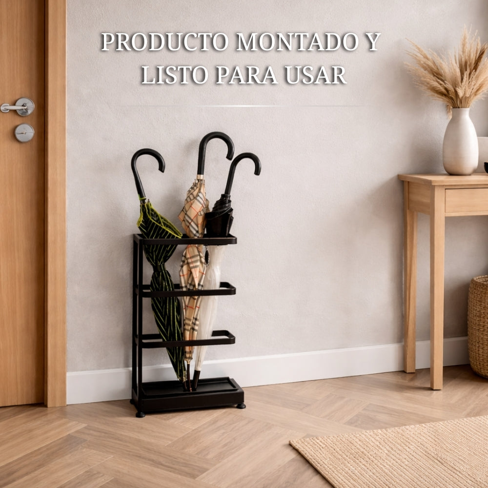 paragüero negro con varios paraguas colocado en la entrada de casa junto a la puerta, listo para usar y con diseño moderno